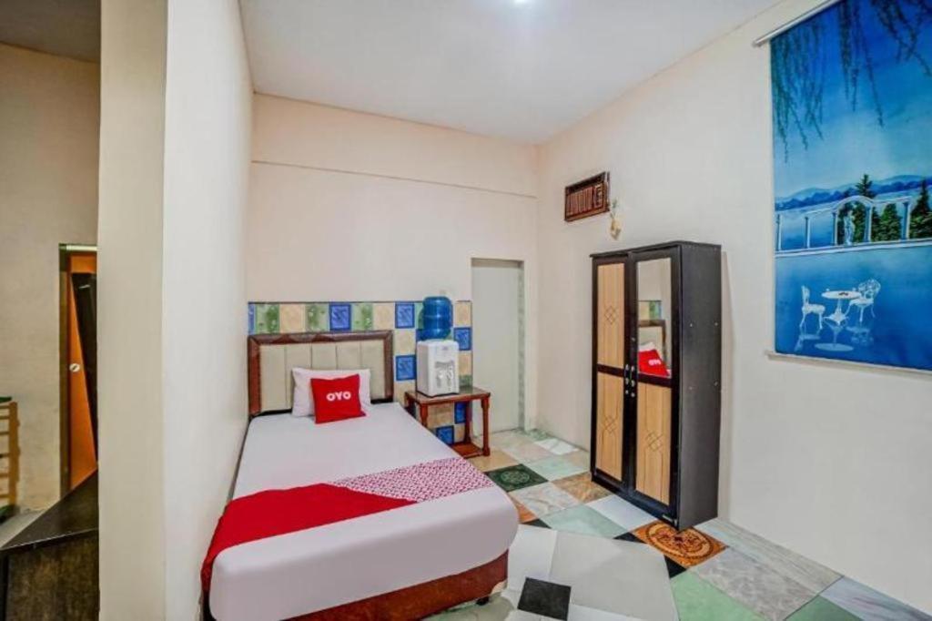 Oyo 90980 Al Karim Syariah Hotel Tanjungbalai Buitenkant foto